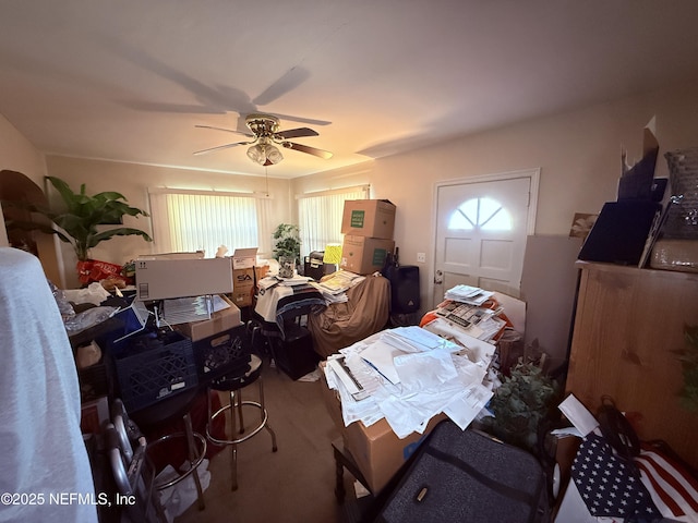 interior space with a ceiling fan