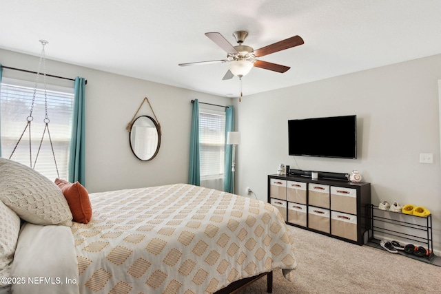 carpeted bedroom featuring a ceiling fan