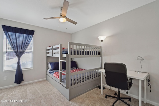 bedroom featuring ceiling fan, carpet floors, and baseboards