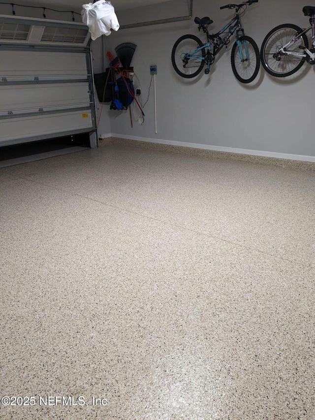 garage with baseboards