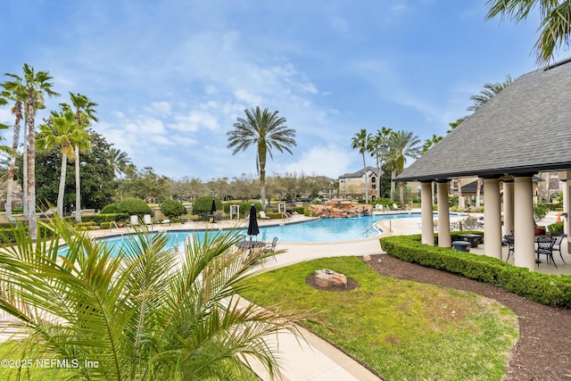 10961 Burnt Mill Rd Unit 935, Jacksonville, FL 32256 - community pool featuring a patio area