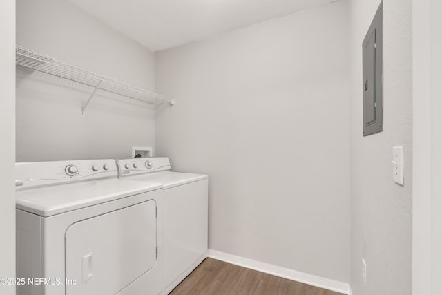 10961 Burnt Mill Rd Unit 935, Jacksonville, FL 32256 - laundry area with separate washer and dryer, light wood-style flooring, and baseboards