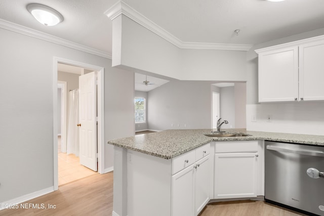 10961 Burnt Mill Rd Unit 935, Jacksonville, FL 32256 - kitchen featuring dishwasher, a sink, crown molding, white cabinetry, and light stone countertops