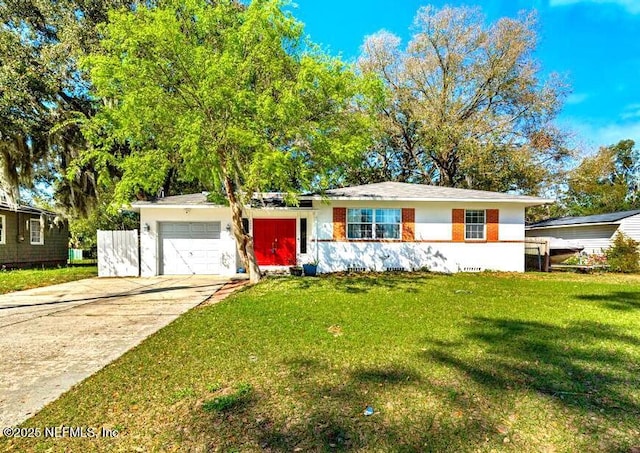 ranch-style house with a front yard, concrete driveway, and an attached garage