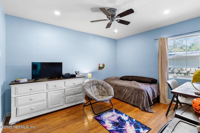 bedroom with recessed lighting, light wood-type flooring, and a ceiling fan