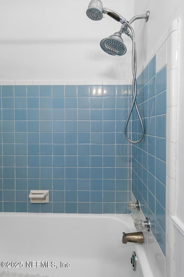 full bath with shower / bathing tub combination