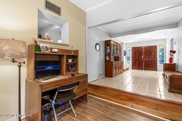 office with visible vents, crown molding, and wood finished floors