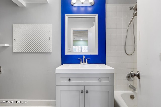 bathroom with vanity and shower / bathing tub combination