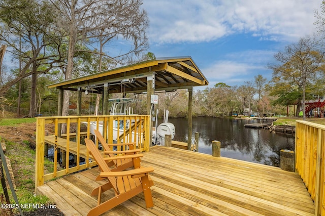 dock area with a water view