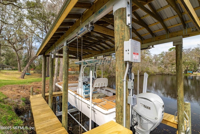 dock area featuring a water view and boat lift