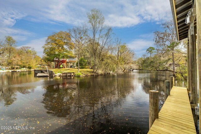 dock area featuring a water view