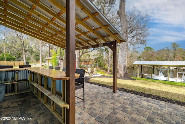 view of patio featuring fence