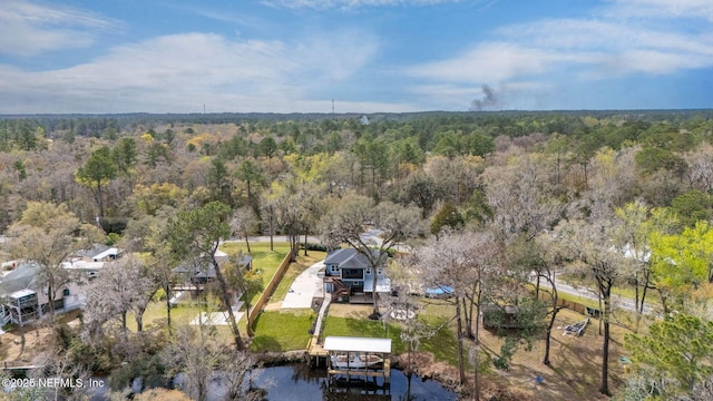 aerial view featuring a forest view