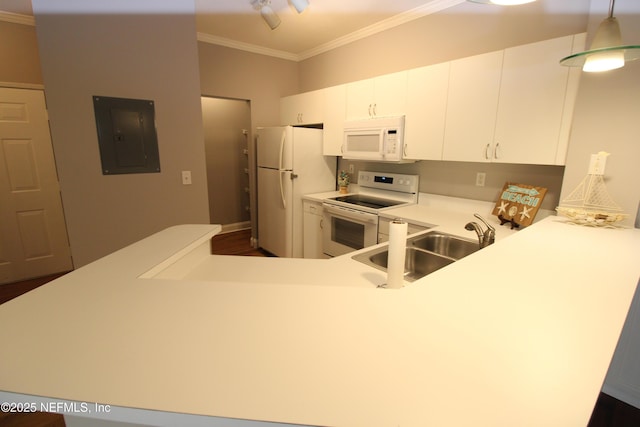 kitchen with crown molding, light countertops, a sink, white appliances, and electric panel