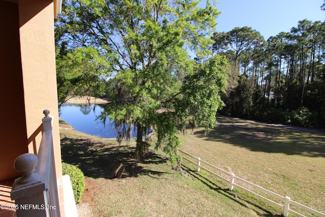 water view featuring fence