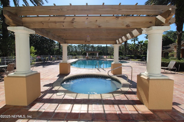 community pool featuring fence, a patio, a hot tub, and a pergola