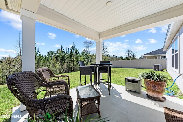 view of patio / terrace featuring a fenced backyard and central AC