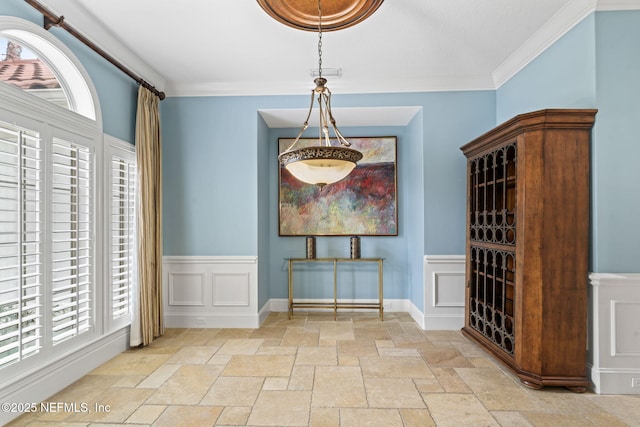 interior space featuring ornamental molding, visible vents, and stone tile flooring