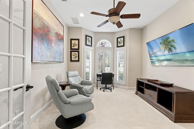 carpeted home office featuring recessed lighting, visible vents, baseboards, and a ceiling fan