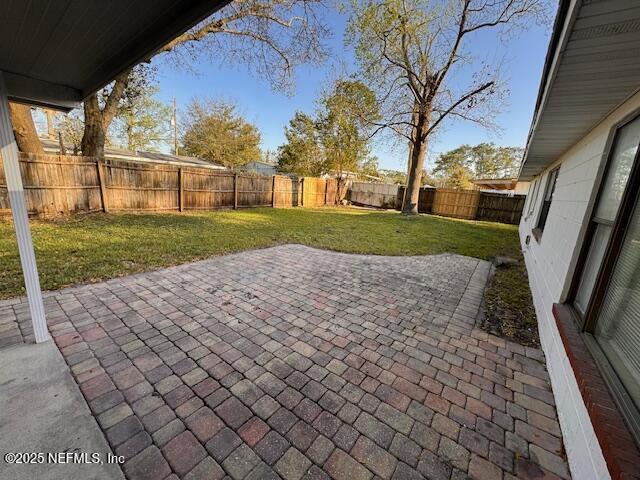 view of patio with a fenced backyard