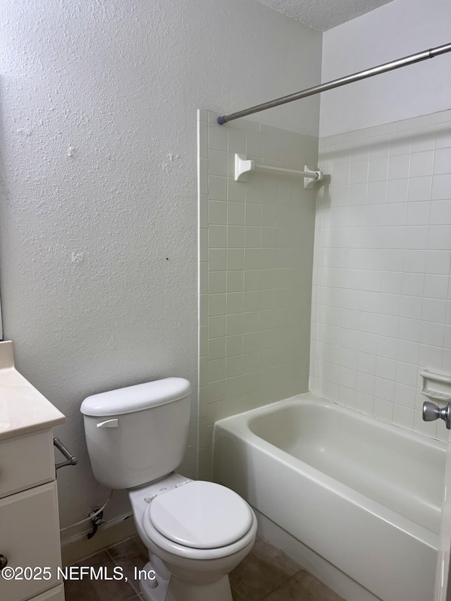 full bathroom with shower / bathtub combination, a textured wall, a textured ceiling, toilet, and vanity