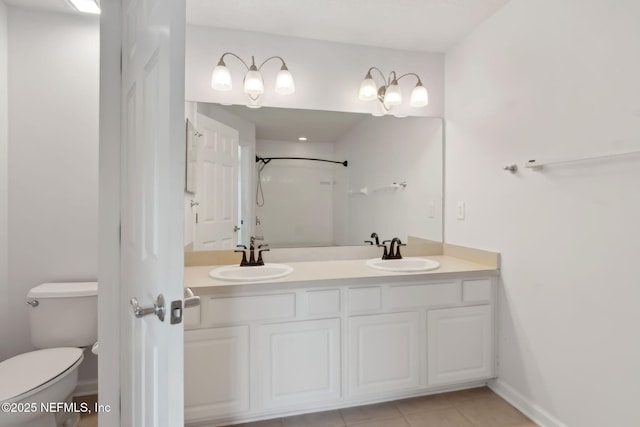 full bath with a shower, tile patterned flooring, a sink, and toilet