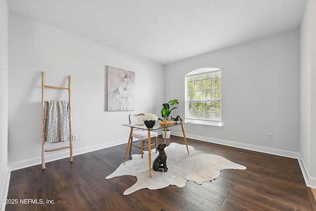 office area with wood finished floors and baseboards