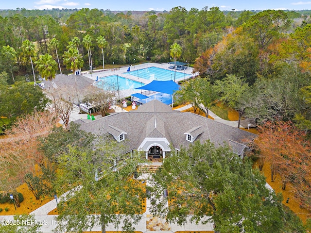 pool featuring a view of trees