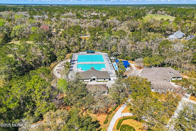 aerial view featuring a forest view