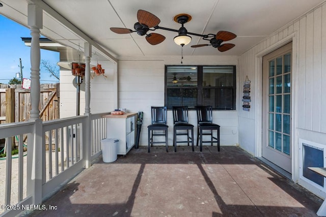 view of patio featuring a ceiling fan