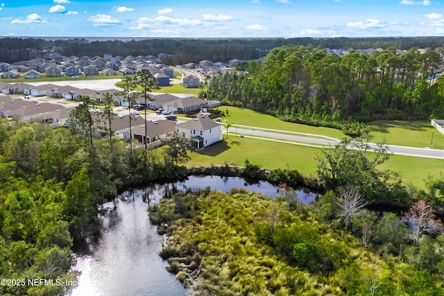 aerial view featuring a water view and a residential view