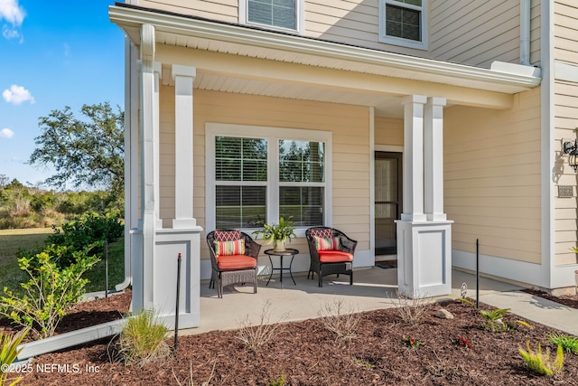 view of patio featuring a porch