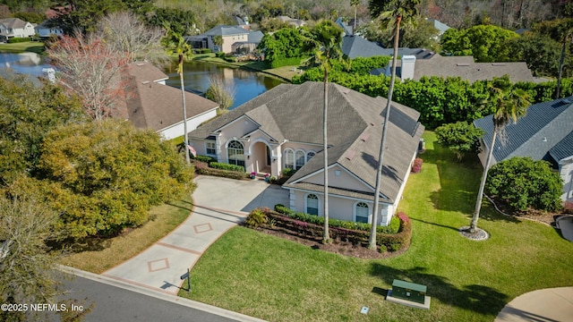 aerial view with a residential view and a water view