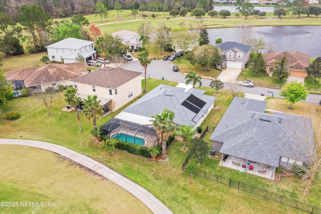 aerial view featuring a water view and a residential view