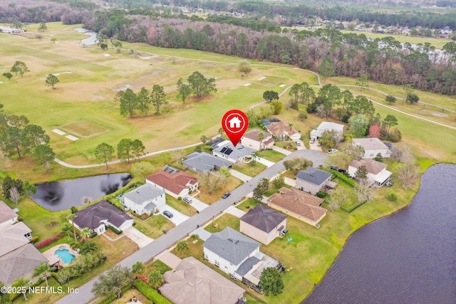 birds eye view of property with a residential view and a water view