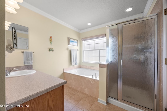 bathroom with crown molding, a shower stall, and vanity