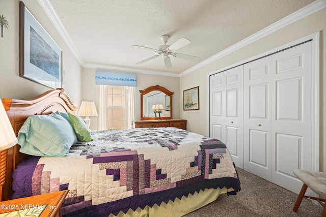 carpeted bedroom with a ceiling fan, a closet, crown molding, and a textured ceiling