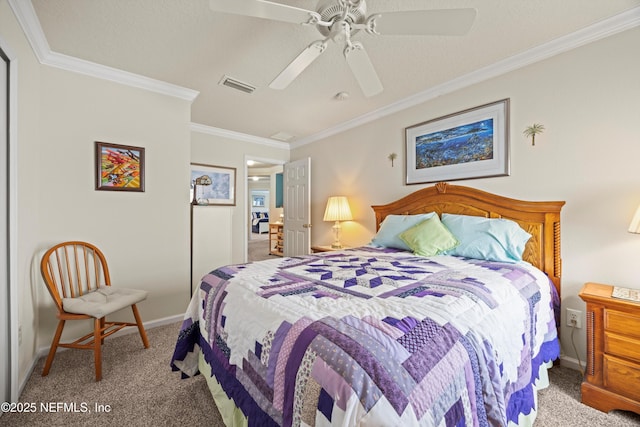 bedroom featuring baseboards, carpet, visible vents, and crown molding