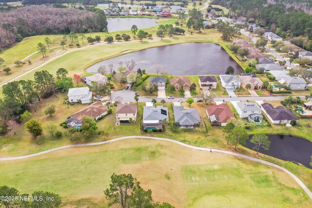 aerial view featuring golf course view, a water view, and a residential view