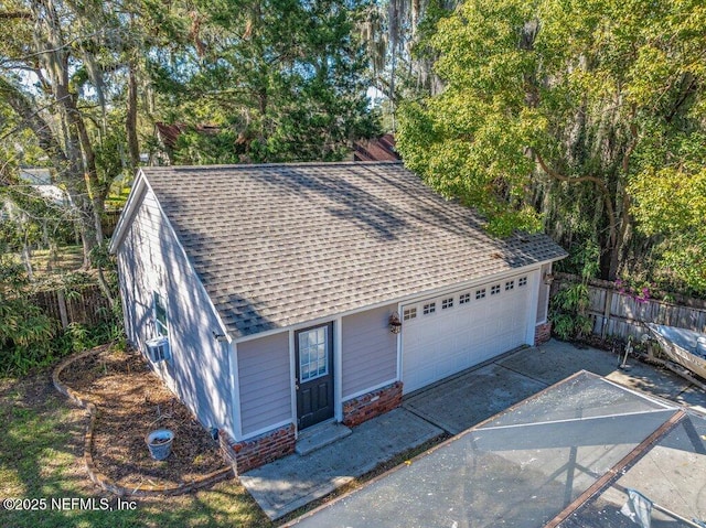 garage featuring fence