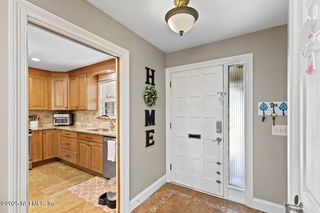 entrance foyer with baseboards