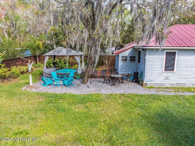 view of yard with a patio area and fence