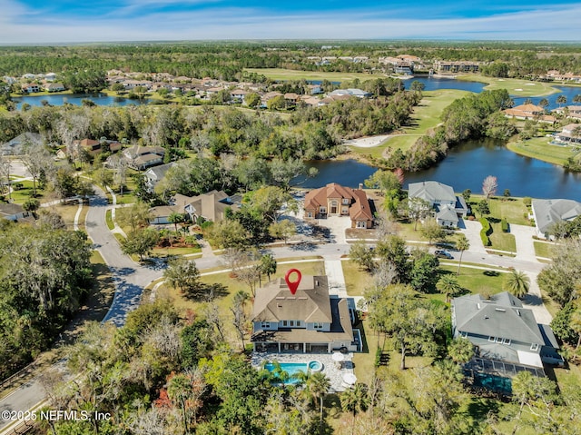 birds eye view of property with a residential view and a water view