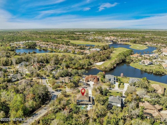 bird's eye view with a residential view, a water view, a view of trees, and golf course view