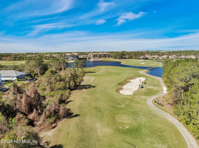 bird's eye view featuring a water view and view of golf course