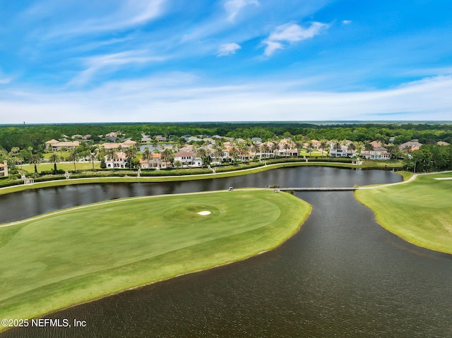 exterior space featuring a residential view, a water view, and golf course view