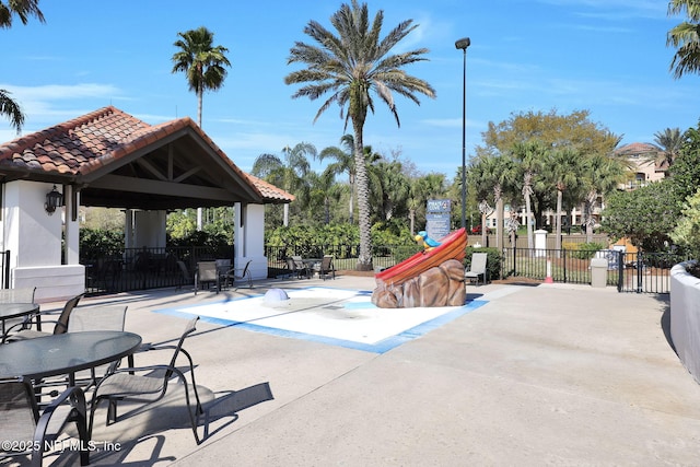 view of patio / terrace featuring a gazebo and fence