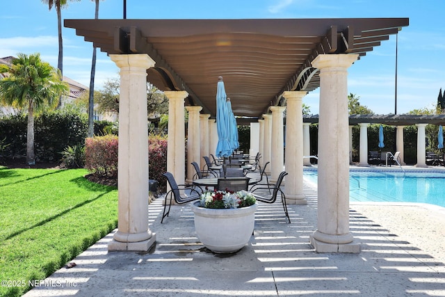 view of patio featuring an outdoor pool and a pergola