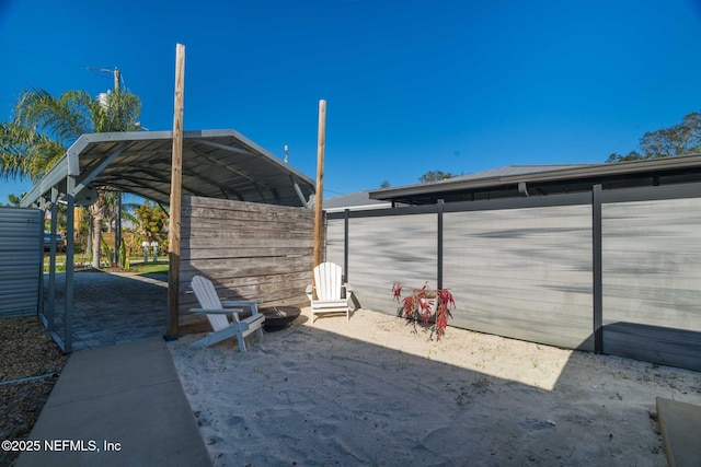 view of outdoor structure with fence