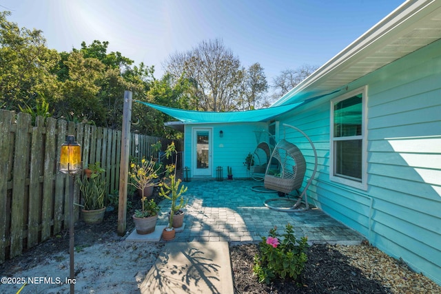 view of patio / terrace with fence